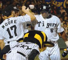 White sparks 10-2 Hanshin win with homer against Giants